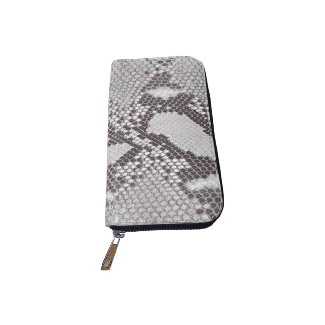 Pochette pour femme en cuir de serpent.